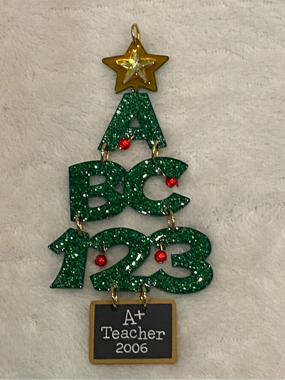 Hallmark Keepsake Christmas Ornament "A+ Teacher" by Sue Teague  Dated 2006 EUC